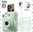 Instax mini 12 Yeşil Fotoğraf Makinesi-10'lu Film-Kıskaçlı Resim Standı ve Simli Pleksi Kılıf Seti