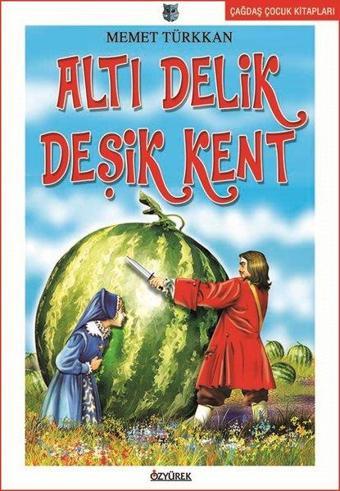 Altı Delik Deşik Kent - Memet Türkkan - Özyürek Yayınevi