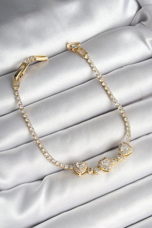 Pirinç Sıralı Kalp Figürlü Zirkon Taşlı Gold Renk Kadın Bileklik SL11925
