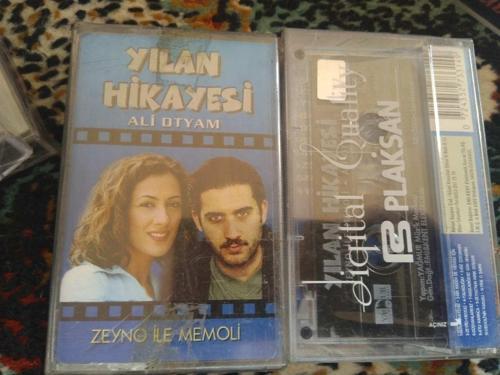 Ali Otyam- Yılan Hikayesi Cam Baskı Jelatinli Kaset