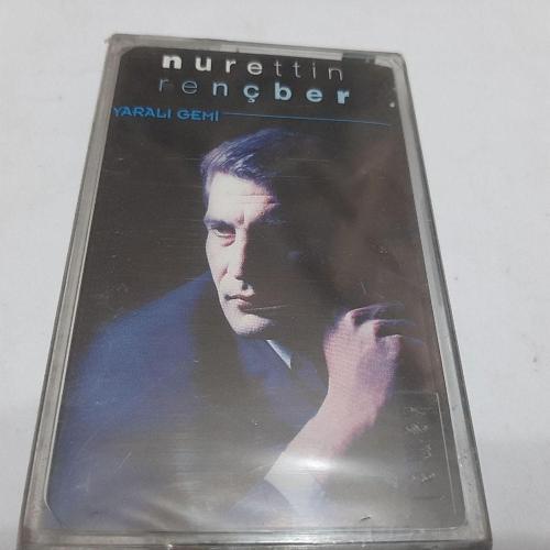  Nurettin Rençber -Yaralı Gemi Jelatinli Cam Baskı Kaset