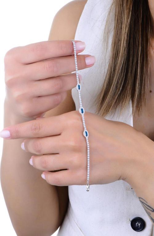 Gümüş rodyumlu pırlanta modeli baget kesim safir ve zirkon taşlı göz dizisi su yolu bileklik [barcode]