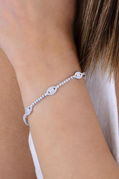 Gümüş rodyumlu pırlanta modeli baget kesim zirkon taşlı göz dizisi su yolu bileklik [barcode]