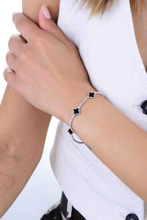 Gümüş rodyumlu pırlanta modeli onix ve zirkon taşlı yonca dizisi su yolu bileklik [barcode]