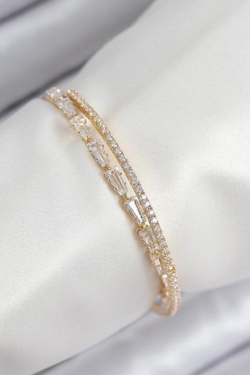 Pirinç Zirkon Taşlı Su Yolu Model Gold Renk Kadın Bileklik