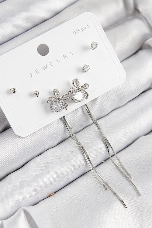 Pirinç Zirkon Taşlı Sallantılı Fiyonk Model Gümüş Renk 925 Ayar Gümüş Çivi Kadın Küpe Set