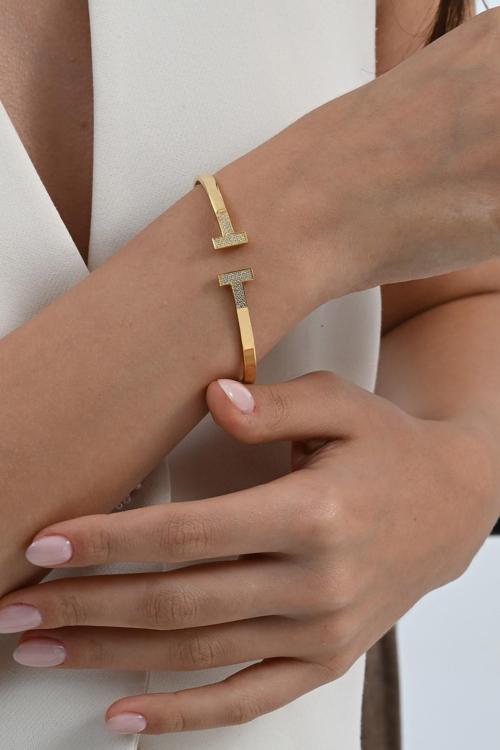 925 ayar gümüş altın yaldızlı zirkon taşlı T model bilezik [barcode]