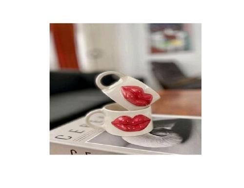 El yapımı seramik kırmızı dudak kupa bardak