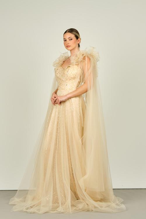 Ömür Inn Kadın Kolu Tül ve Otrişli Fiyonk Süslemeli Uzun Abiye Elbise 4118 Şampanya