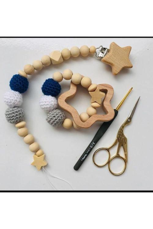 Emzik Zinciri Ve Diş Kaşıyıcı