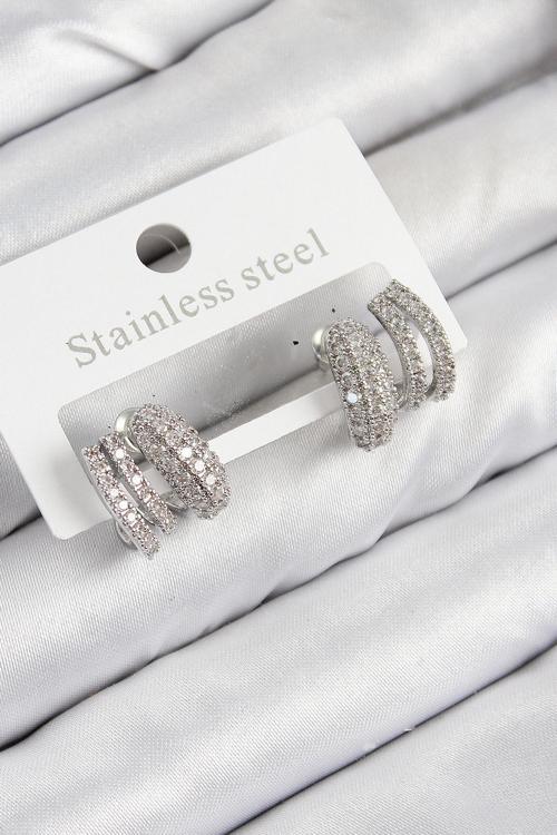 Pirinç Zirkon Taşlı Kıvrımlı Gümüş Renk Kadın Küpe