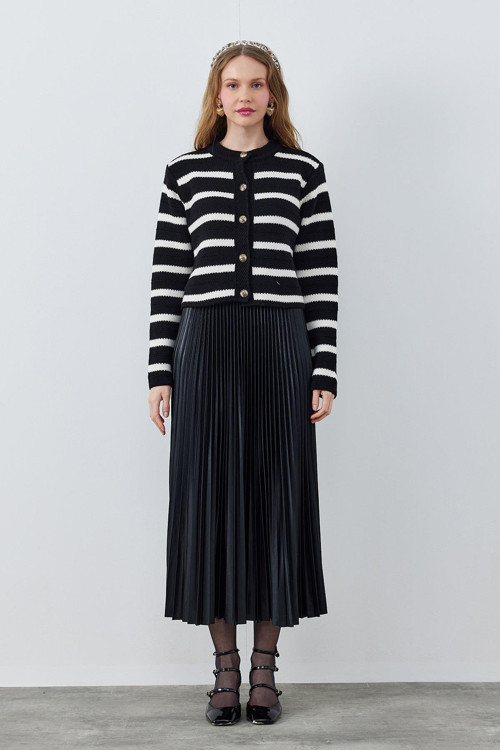 DERİ GÖRÜNÜMLÜ DÜZ PİLİSELİ ETEK