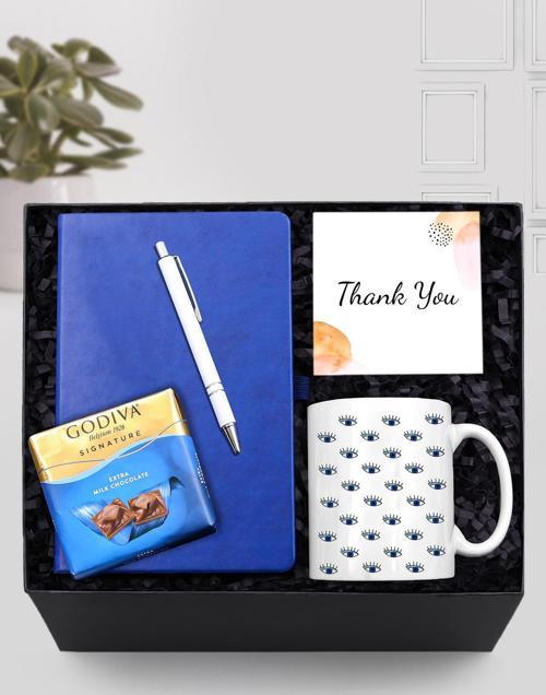 Mavi Defter & Nazar Boncuklu Göz Kupa & Gümüş Renk Detaylı Beyaz Tükenmez Kalem & Godiva Hediye Seti