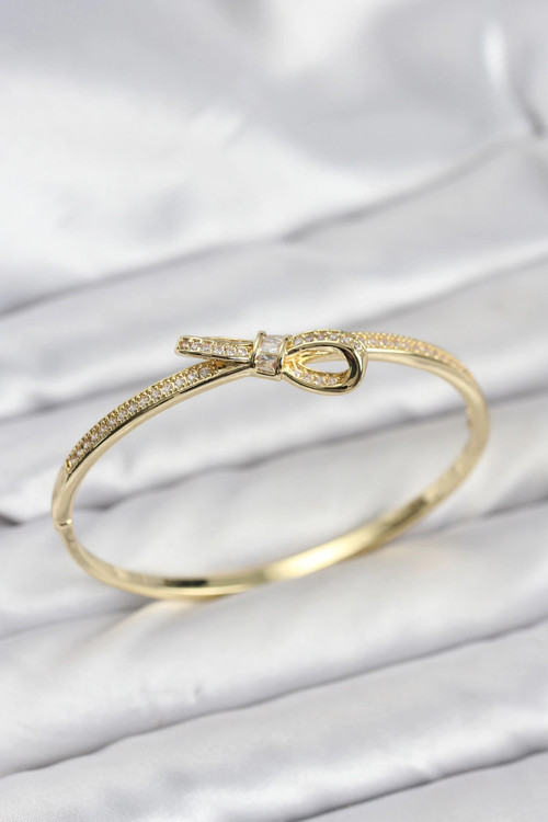 Pirinç Gold Renk Zirkon Taşlı Fiyonk Model Kadın Kelepçe Bileklik