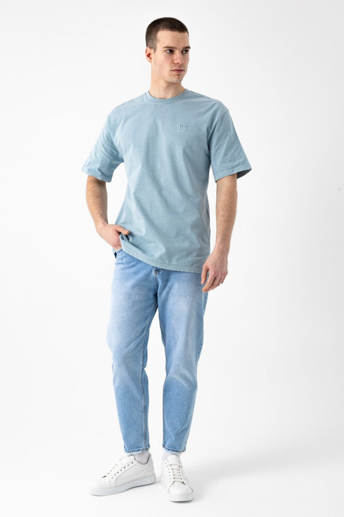 Paça Yıpratmalı Tapered Jean