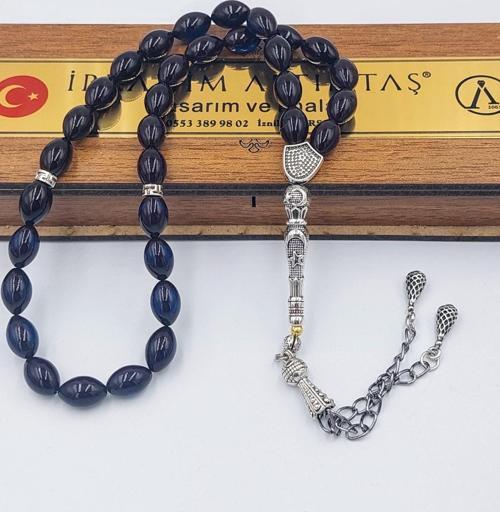 ÇİFT ALPAKA PÜSKÜLLÜ ARPA KESİM SİYAH-MAVİ ATEŞ KEHRİBAR TESPİH