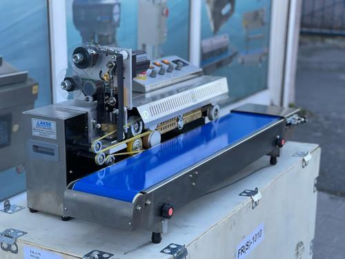 FRBS 1010 Konveyörlü Otomatik Yatay Poşet Ağzı Kapatma Makinesi Tarih Kodlamalı