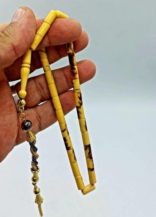 SARI/SİYAH KESME MODEL HARELİ  ALPAKA PÜSKÜL KEHRİBAR TESPİH