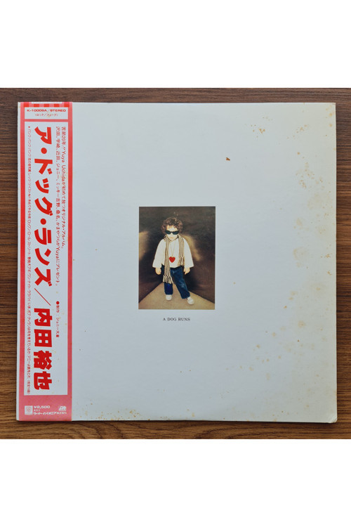Yuya Uchida – A Dog Runs