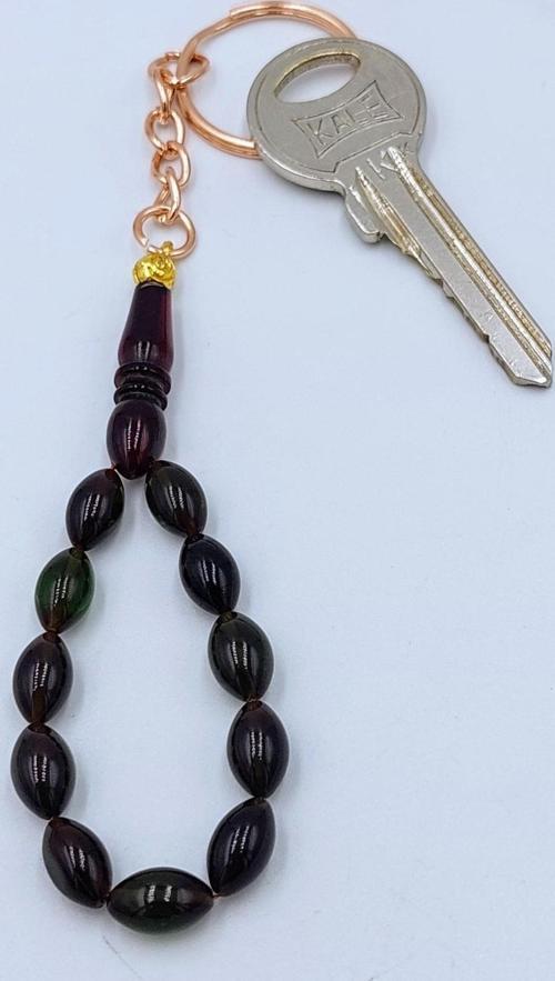 ARPA KESİM ŞEFFAF YEŞİL ATEŞ KEHRİBAR ANAHTARLIK