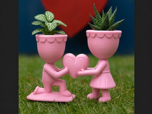 Alvera Aşk Saksısı – 3D Baskı Kalp Tutan Çift Figürlü Dekoratif Saksı - Pembe