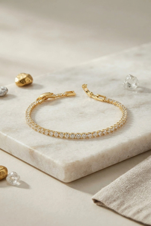 Pirinç Gold Renk İnce Zirkon Taşlı Su Yolu Kadın Bileklik