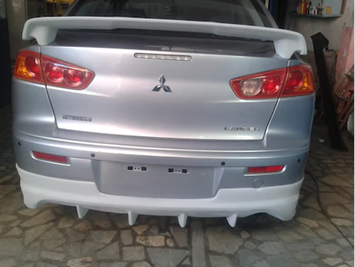 Mitsubishi Lancer Evo Arka Tampon Eki Fiber Boyasız 2009-