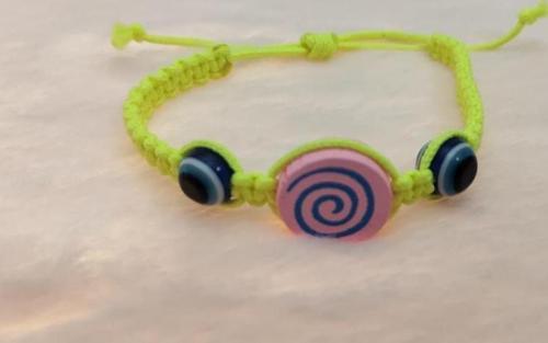 Sevimli Nazar Boncuklu Hipnoz Figürlü Örgü Ayarlanabilir Bileklik Sarı