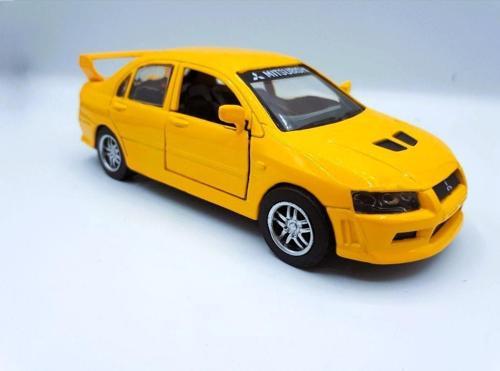 1:32 New Ray MITSUBISHI LANCER EVOLUTION VII Metal Kapıları Açılır 13 cm. Model Araba