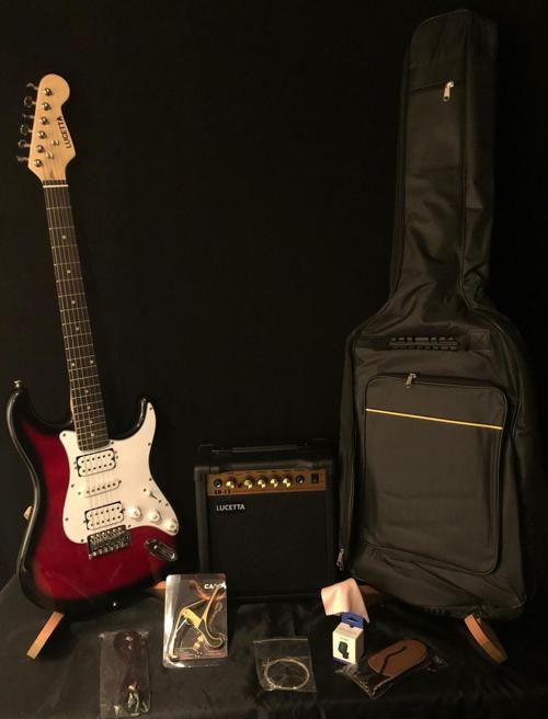 Elektro Gitar Seti(Gitar-Amfi-Askı-Kapo-Tuner-Kılıf-Kablo-Pena-Yedek Takım Tel)