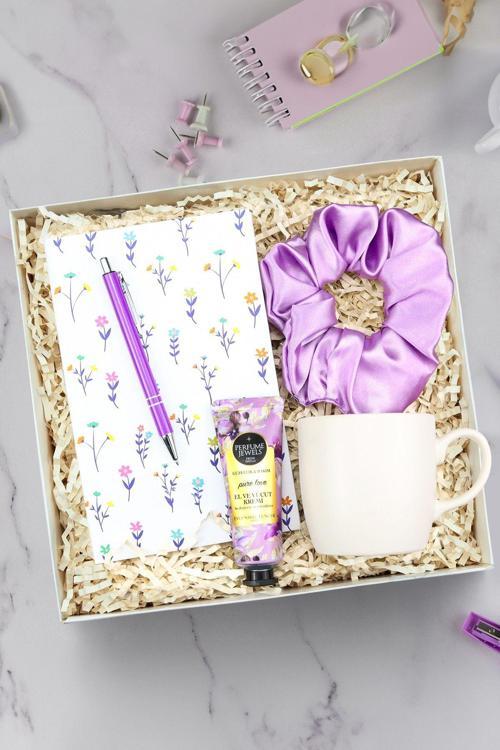 Çiçekli Tasarım Defter & Mor Tükenmez Kalem & El Kremi & Saten Toka & Beyaz Mat Kupa Hediye Seti