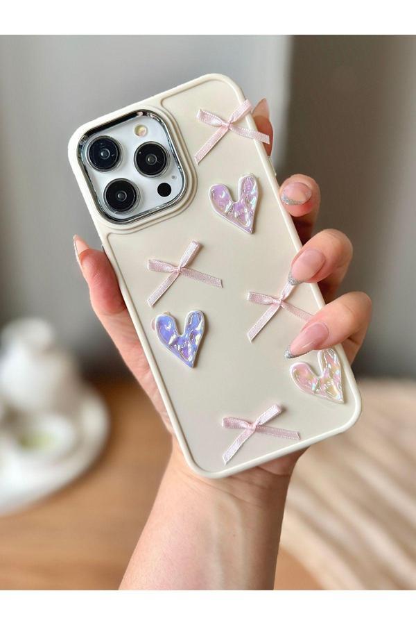 Miraz Tasarim Iphone 15 Pro Max 3D Fiyonk/Kalp Dekorlu Ekru Kılıf - Image 1