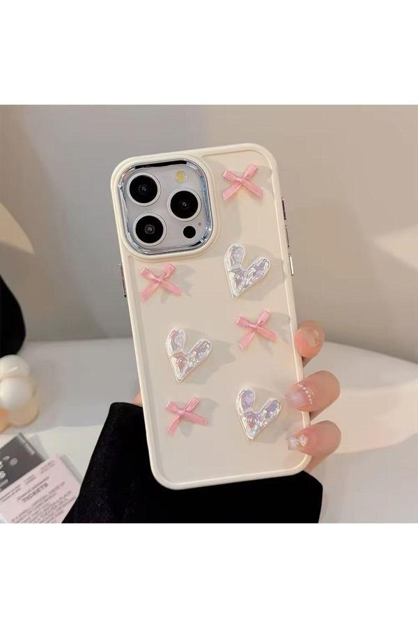 Miraz Tasarim Iphone 16 Promax 3D Kalp Ve Fiyonk Dekorlu Ekru Renk Kılıf - Image 1