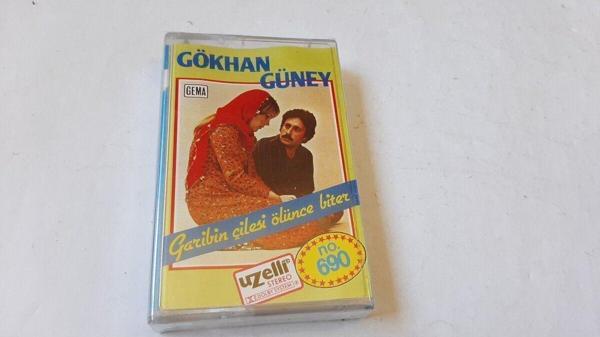  Gökhan Güney -Garibin Çilesi Ölünce Biter Uzelli Cam Baskı Kaset Jelatinli - Image 1