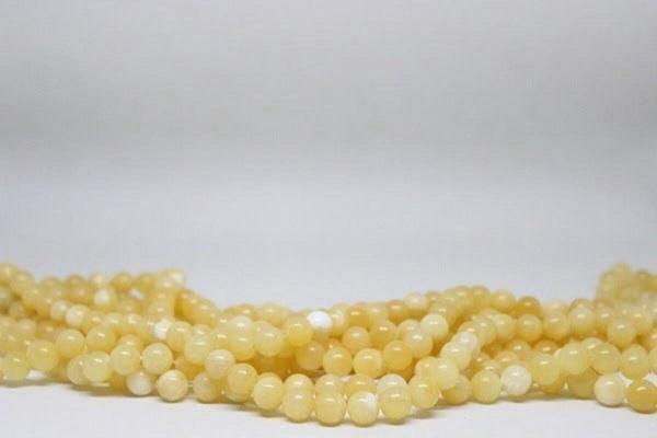 Kalsit Taşı YARIM Dizi 10mm (18cm uzunluğundadır) - Image 1