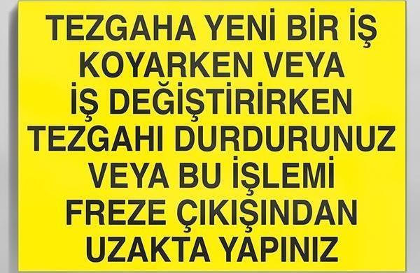 Tezgaha Yeni Bir İş Koyarken Veya İş Değiştirirken Tezgahı Durdurunuz Veya Bu İşlemi Freze Çıkışından Uzakta Yapınız Uyarı Levhası 70x100cm - Image 1
