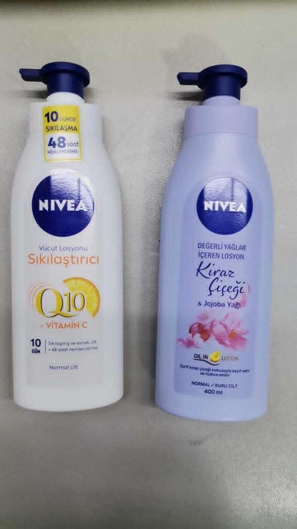 Nivea Q10 Sıkılaştırıcı Vücut Losyonu 400 Ml + Kiraz Çiçeği & Jojoba Yağı Pump Losyon - Image 1