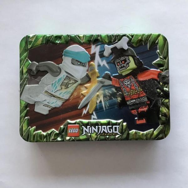LEGO Ninjago 112402 Zane vs. Bone King - Metal Box - Image 1