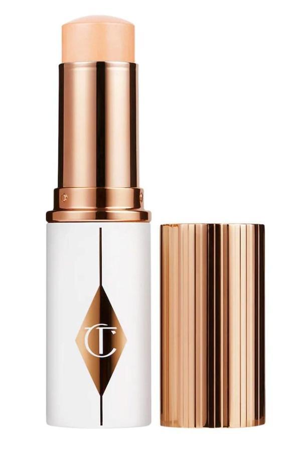 Charlotte Tilbury Unreal Skin Sheer Glow Tint 4 Fair - Nemlendirici Stick fondöten 8 ml - Image 1