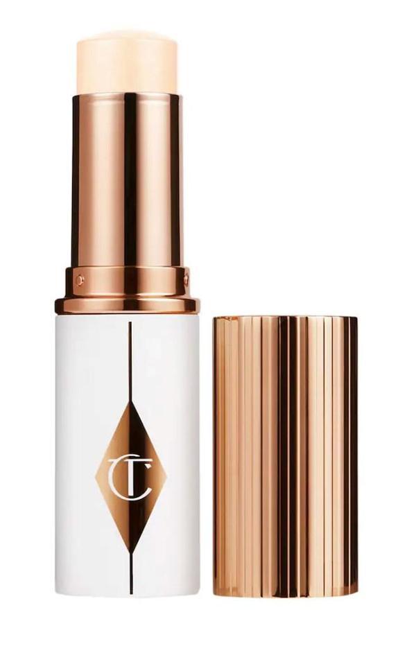 Charlotte Tilbury Unreal Skin Sheer Glow Tint 1.5 Fair - Nemlendirici Stick fondöten 8 ml - Image 1