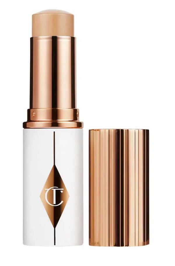 Charlotte Tilbury Unreal Skin Sheer Glow Tint 5 Medium - Nemlendirici Stick fondöten 8 ml - Image 1