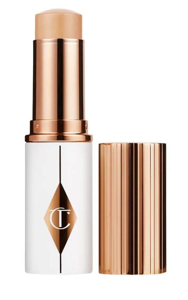 Charlotte Tilbury Unreal Skin Sheer Glow Tint 7.5 Medium- Nemlendirici Stick fondöten 8 ml - Image 1