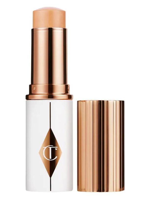 Charlotte Tilbury Unreal Skin Sheer Glow Tint 6 Medium - Nemlendirici Stick fondöten 8 ml - Image 1