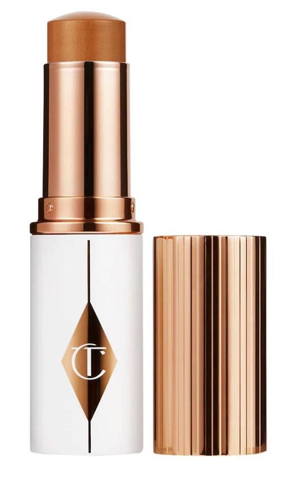 Charlotte Tilbury Unreal Skin Sheer Glow Tint 11 Tan - Nemlendirici Stick fondöten 8 ml - Image 1