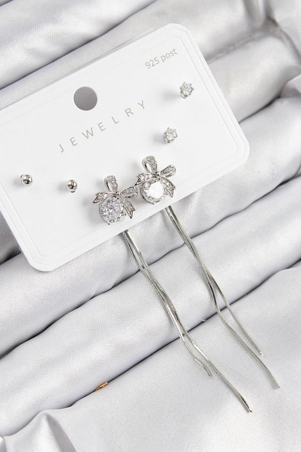 Pirinç Zirkon Taşlı Sallantılı Fiyonk Model Gümüş Renk 925 Ayar Gümüş Çivi Kadın Küpe Set - Image 1