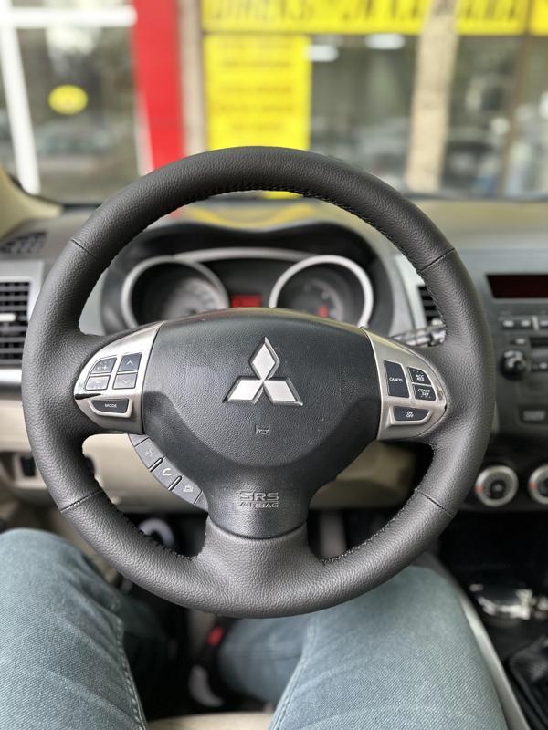 Mitsubishi L200 Araca Özel Dikmeli Direksiyon Kılıfı - Image 1