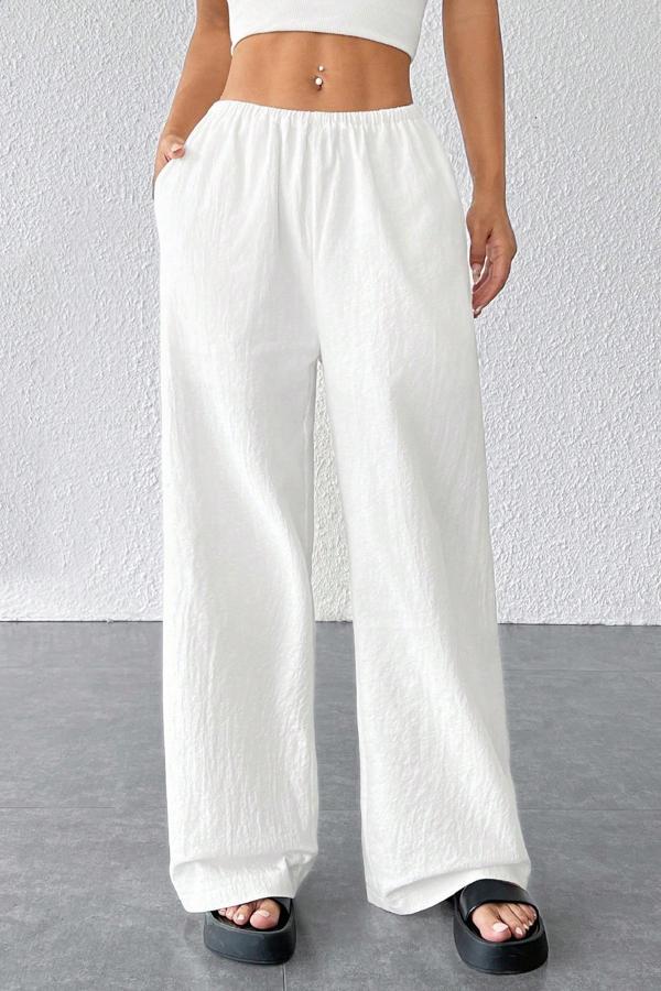 Kadın Beyaz Bol Kesim Cepli Geniş Paça Dökümlü Pantolon - Image 1