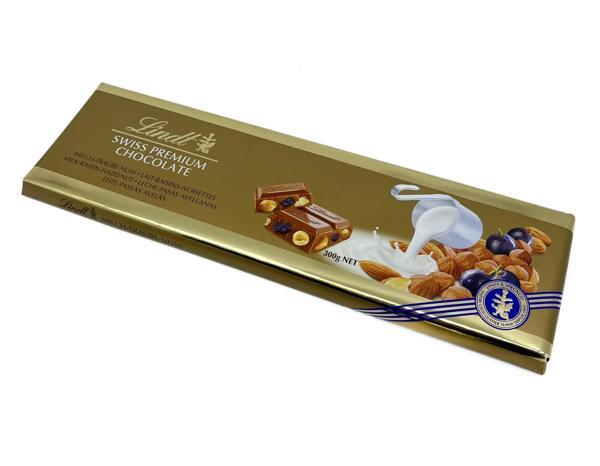 Lindt Swiss Premium Kuru Üzümlü, Bademli, Fındıklı Sütlü İsviçre Çikolatası 300 g - Image 1