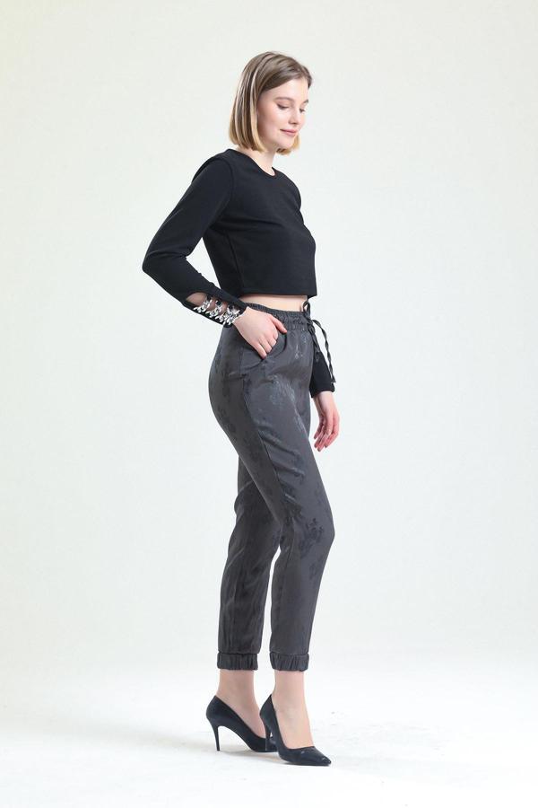 Sense Bel Ve Paçalar Lastikli Bağcıklı Pantolon Haki Çiçekli Pnt32963
Pnt32963 - Image 1