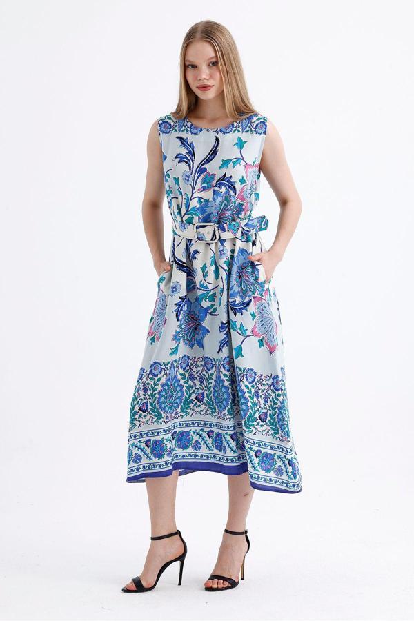 Sense Kemer Detaylı Uzun Empirme Viskon Jile Elbise Saks Beyaz Kalpli Elb35653
Elb35653 - Image 1